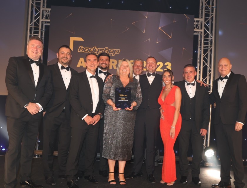 Pictured, David Croft, Formula 1 Commentator Presenting the Award to the Autocraft Telford Team (From Left: Phil Poole, Darren Fielding, Kareem Zaman, Tina Williams, Phil Travis, Matt Fielding, Maddison Fielding, Darren Ogden).